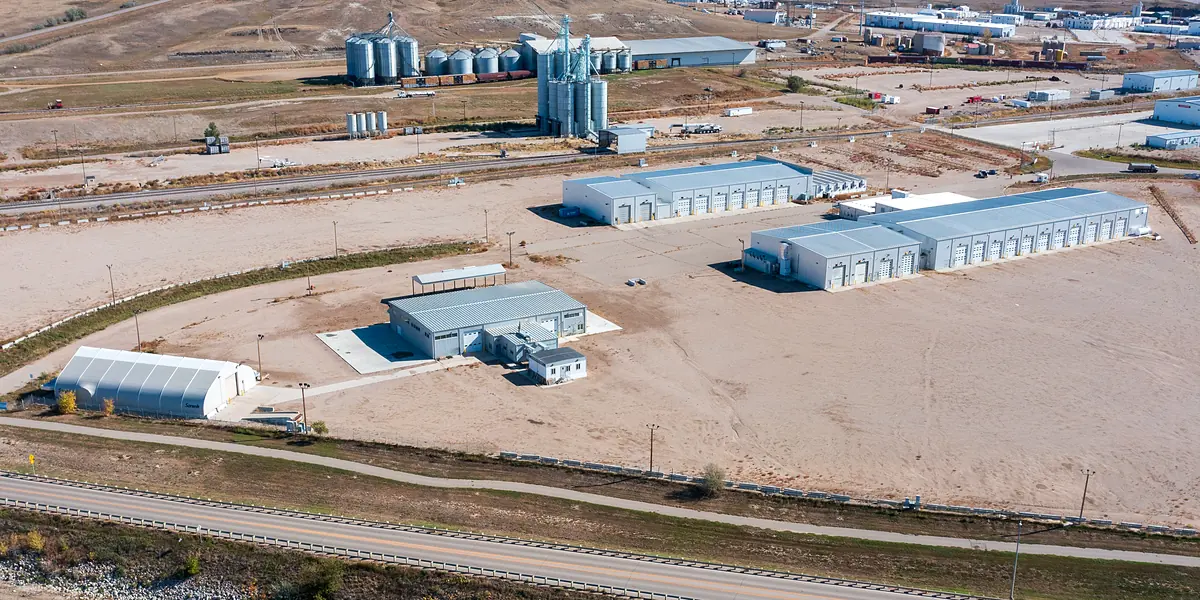 Shop buildings and yard at 511 22nd Ave NE in Williston, North Dakota, sold by Lunnen Real Estate Services